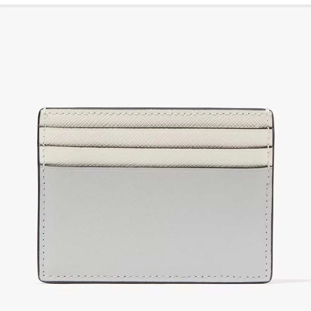 Kate Spade Madison Small Slim Card Holder
Platinum Grey Multi
NWT - Picture 4 of 16